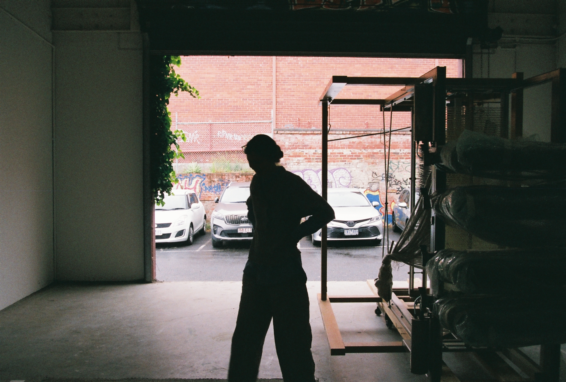 Community member at the loom